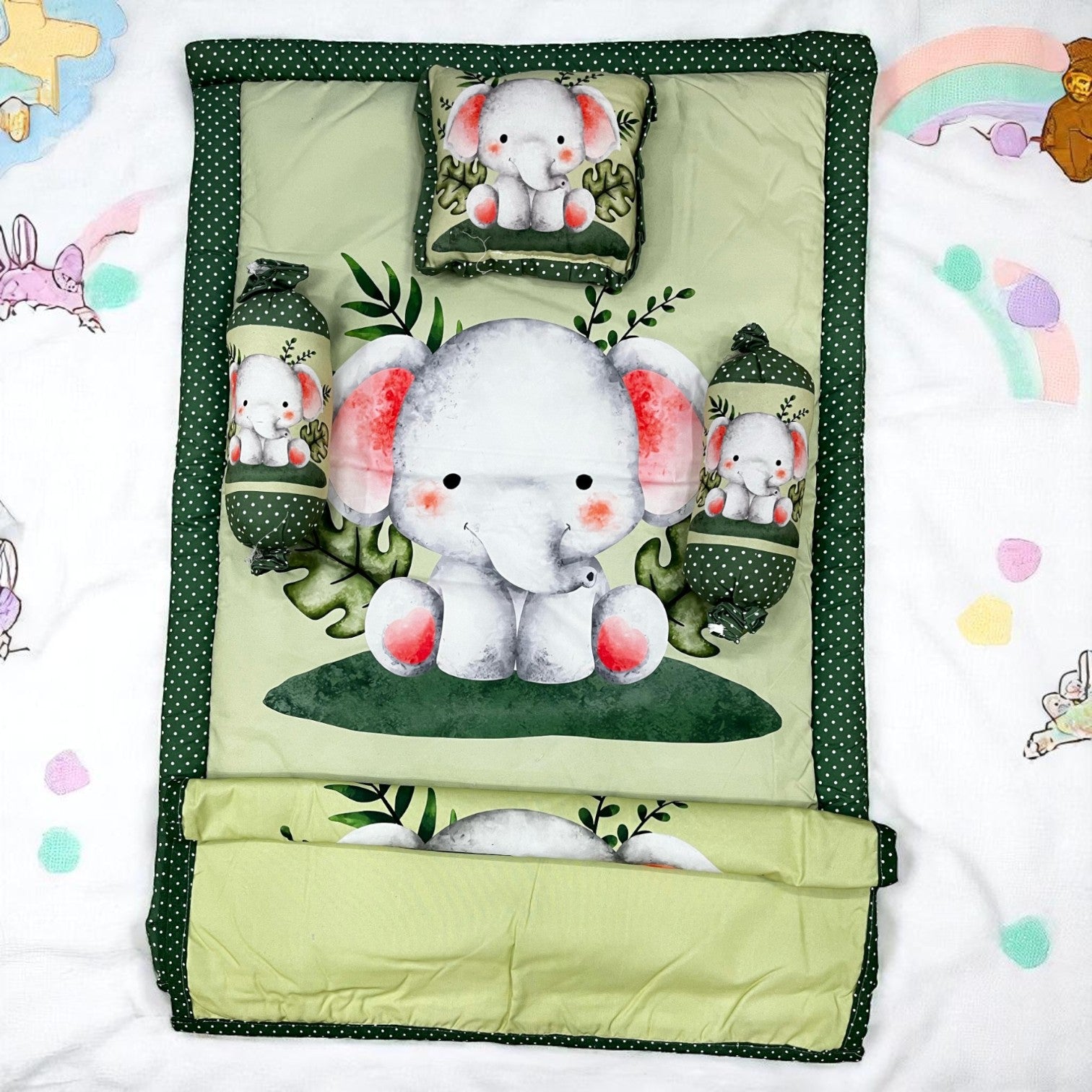 Adorable 7-piece baby bedding set featuring playful elephant designs, providing a complete and cozy sleep solution for newborns. This versatile combo is a must-have for new parents, ensuring comfort and safety. www.usmile.com